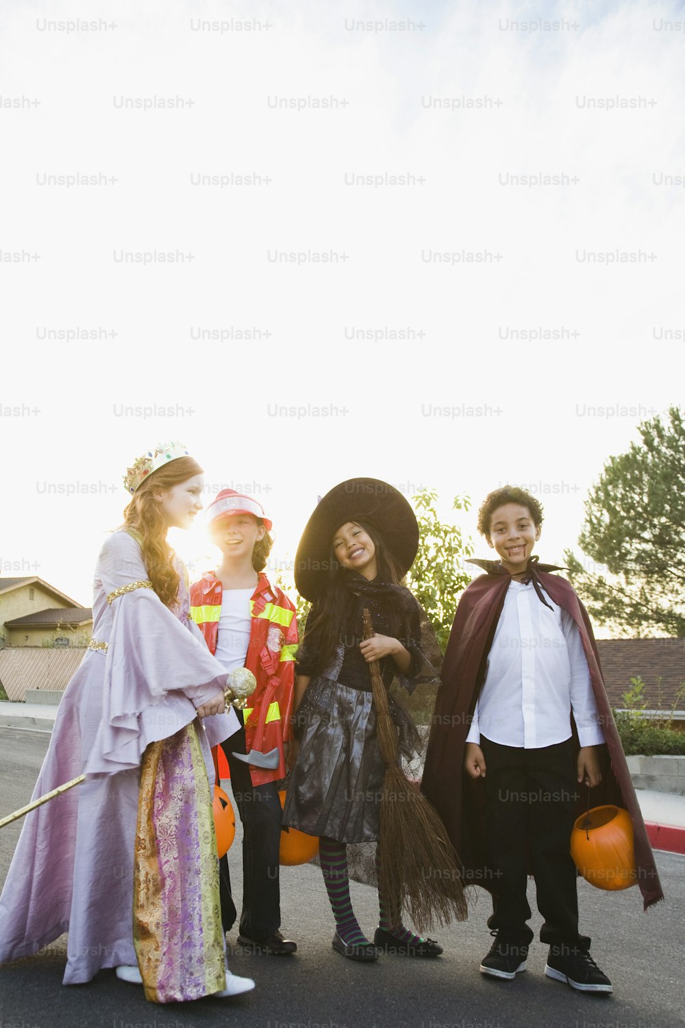 a group of kids dressed up in halloween costumes