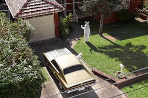 a car parked in front of a house