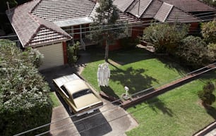 a car parked in front of a house