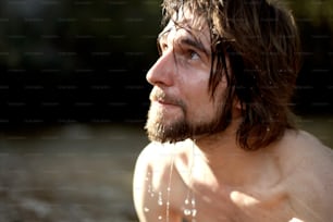 a man with wet hair and no shirt on