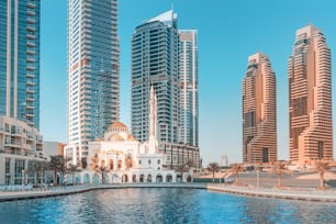 Dubai marina skyscrapers and famous muslim mosque