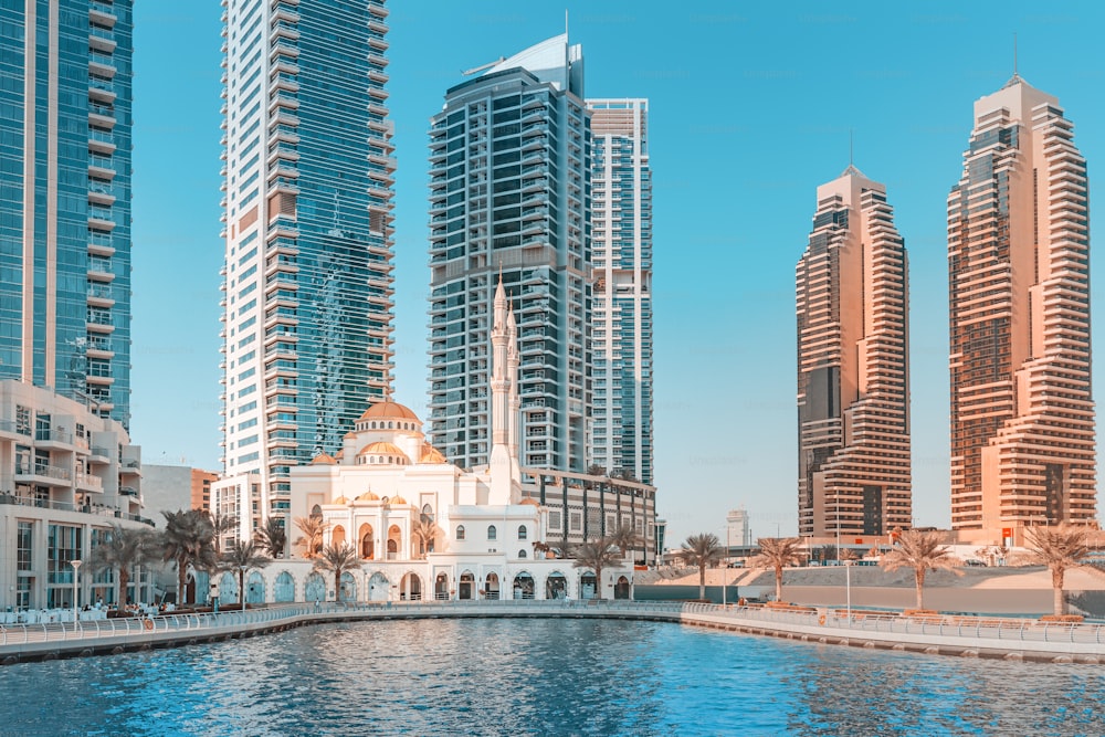 Dubai marina skyscrapers and famous muslim mosque