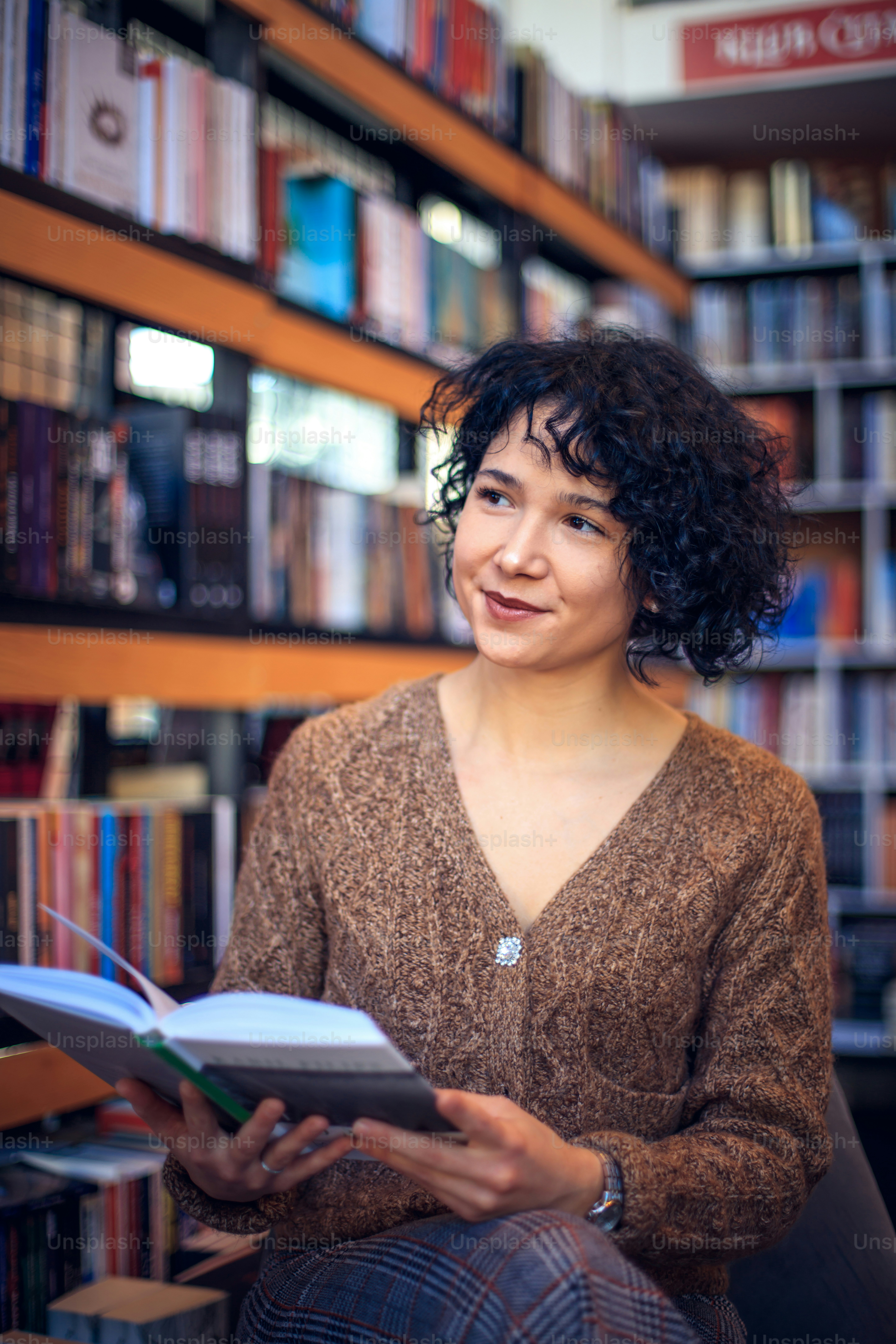 Woman in library choosing the book. photo – Book Image on Unsplash
