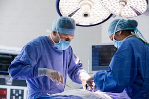 two surgeons performing surgery on a patient in a hospital