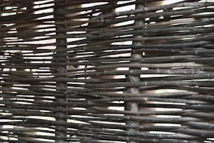 Wicker fence made of dry twigs, close up