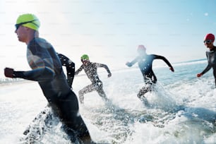 A group of athletes competing in a triathlon