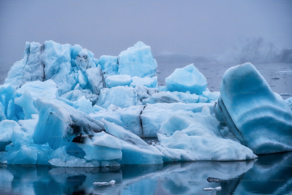 Icebergs in Jokulsarlon beautiful glacial lagoon in Iceland. Jokulsarlon is a famous travel destination in Vatnajokull National Park, southeast Iceland, Europe. Winter landscape.