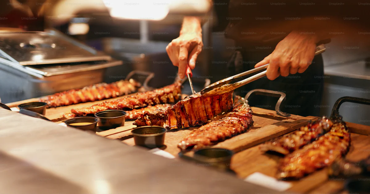 Food In Restaurant. Barbecue Pork Ribs In Grill Bar. Spareribs On ...