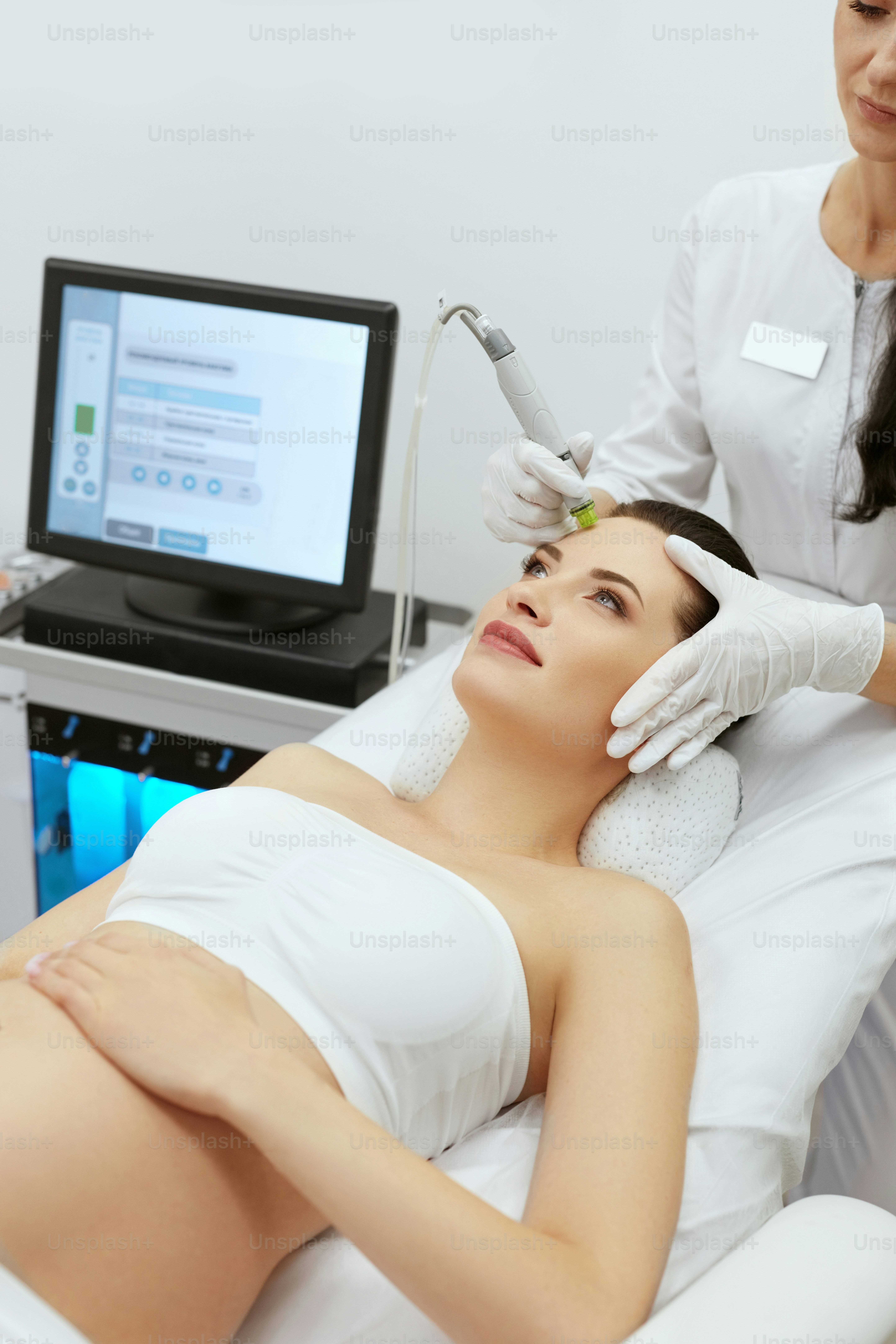 Beauty Clinic. Pregnant Woman Doing Intense Exfoliation, Face Peeling