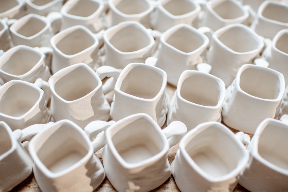 Close-up of ceramic workpieces for jar making at the pottery