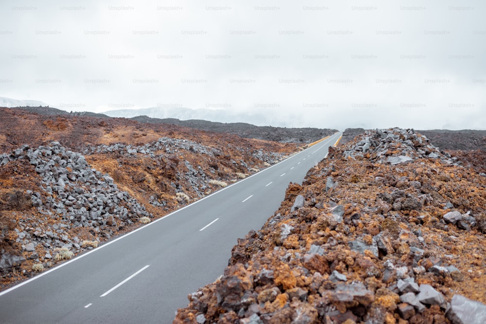 Beautiful straight road on the volcanic valley on Tenerife island, Spain