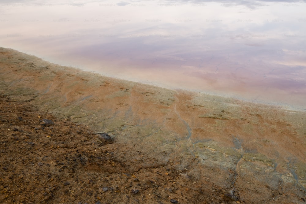 Dirty water and polluted soil or clay on territory with dangerous ecological situation that can be used as environmental catastrophe