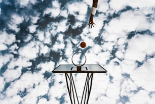 Street basketball ball falling into the hoop - Urban youth game - Concept of success, scoring points and winning