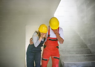 Woman and man workers running at the construction site, suffocating. Carbon monoxide poisonous gas cloud.