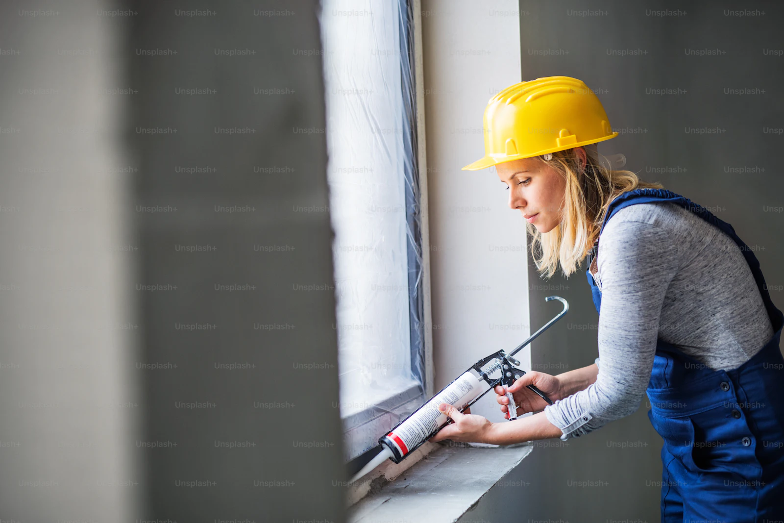 Caulking & Sealant Replacement · rope access work by AIM
