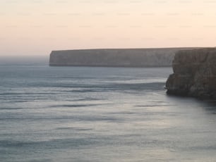 solitary beach during the early sunrise morning. no people walking out there, silence and peace feeling