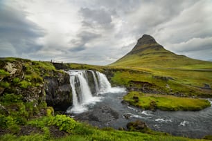 Kirkjufell waterfall and mountain, a beautiful Iceland landscape.
