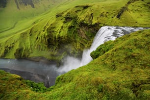A waterfall in a beautiful Iceland landscape, Europe. Top view.