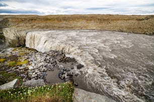 A waterfall in a beautiful Iceland landscape, Europe. Top view.