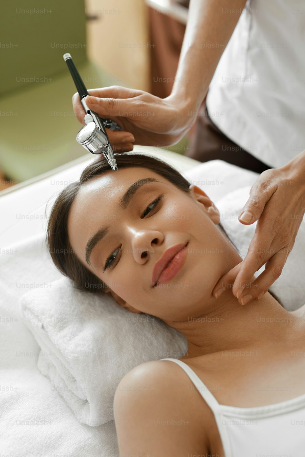 Facial Skin Care. Closeup Of Beautiful Woman Receiving Face Oxygen Peeling At Cosmetology Center. Girl Enjoying Skin Rejuvenation Procedure. Beauty Treatment Concept. High Resolution Image