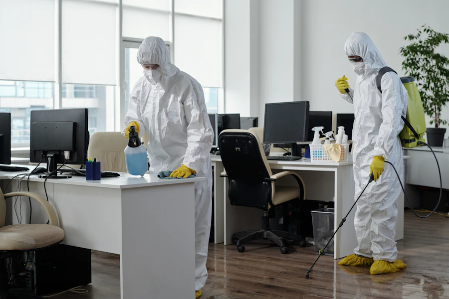 Professional restoration crew in protective gear responding to commercial property damage in Dallas