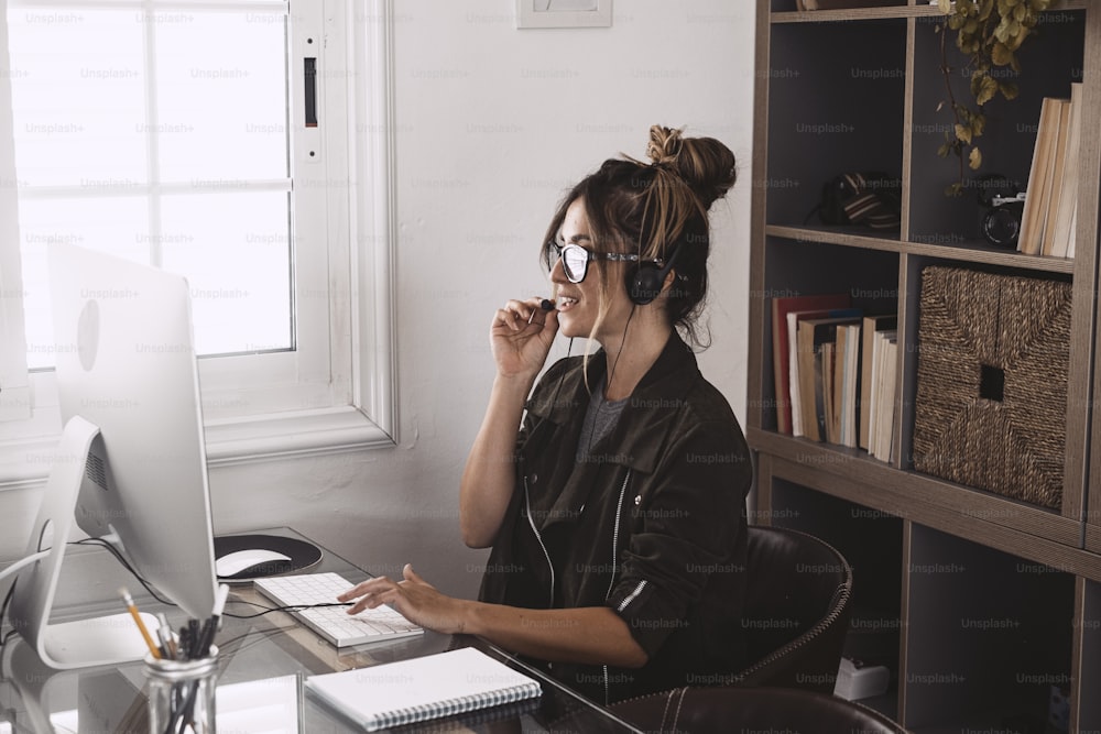 Video conference call in online smart working remote work job home office activity with pretty young age woman enjoying online modern technology and internet connection to be free - businesswoman