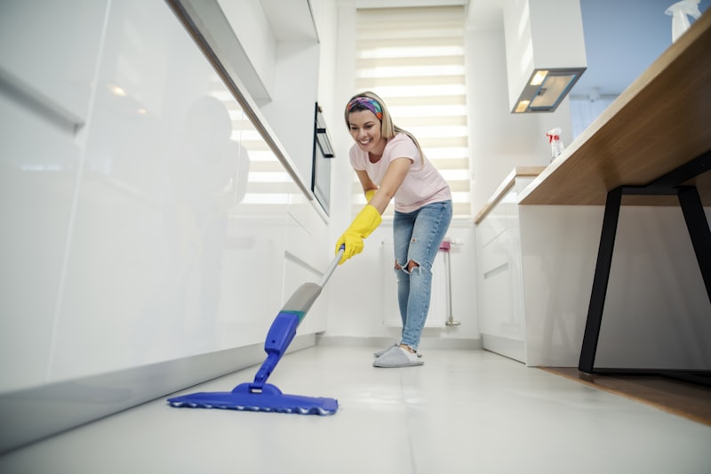 Professional cleaner smiling