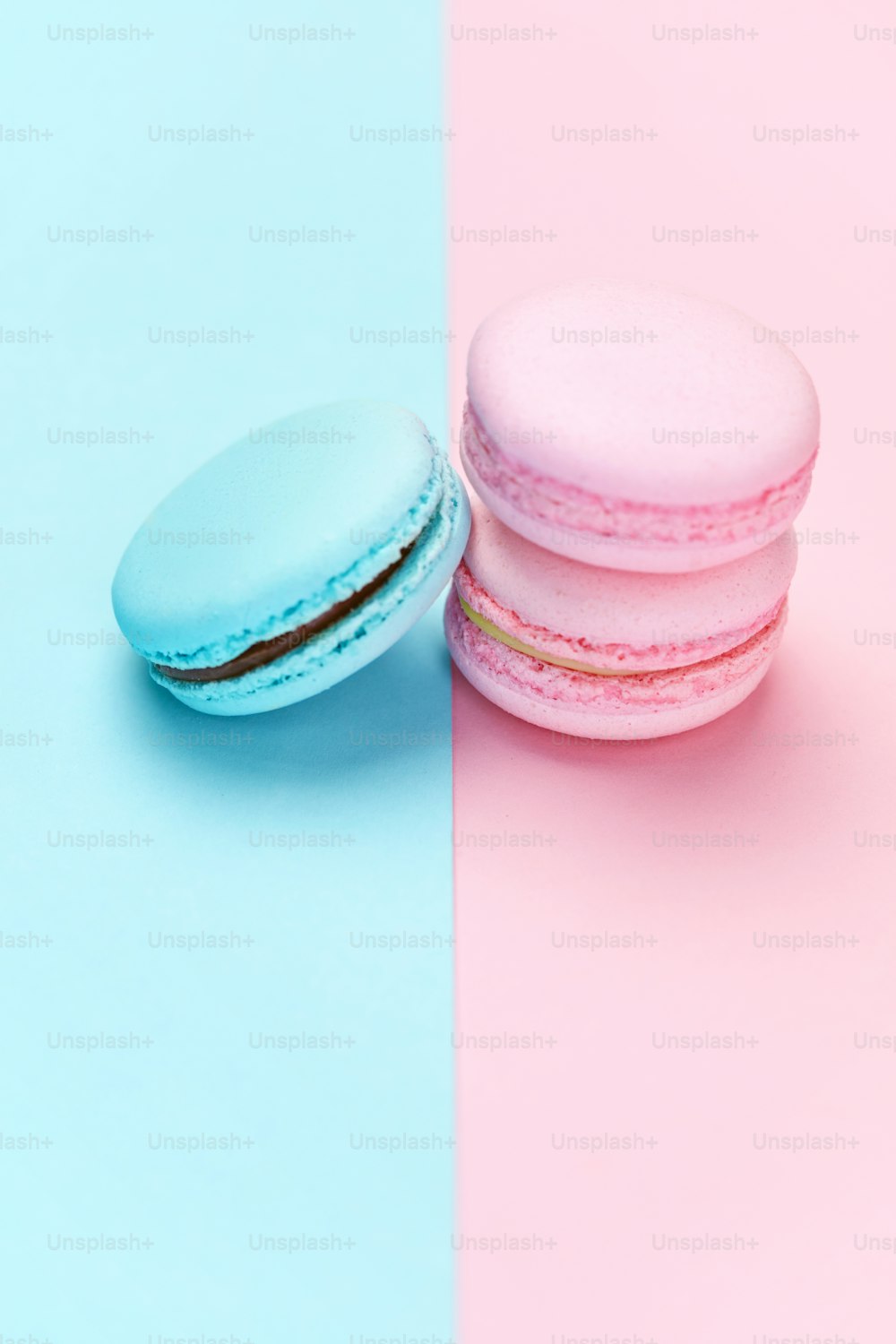 Sweets. Colorful Macaroons Pastel Blue Pink Background Close Up. High Resolution