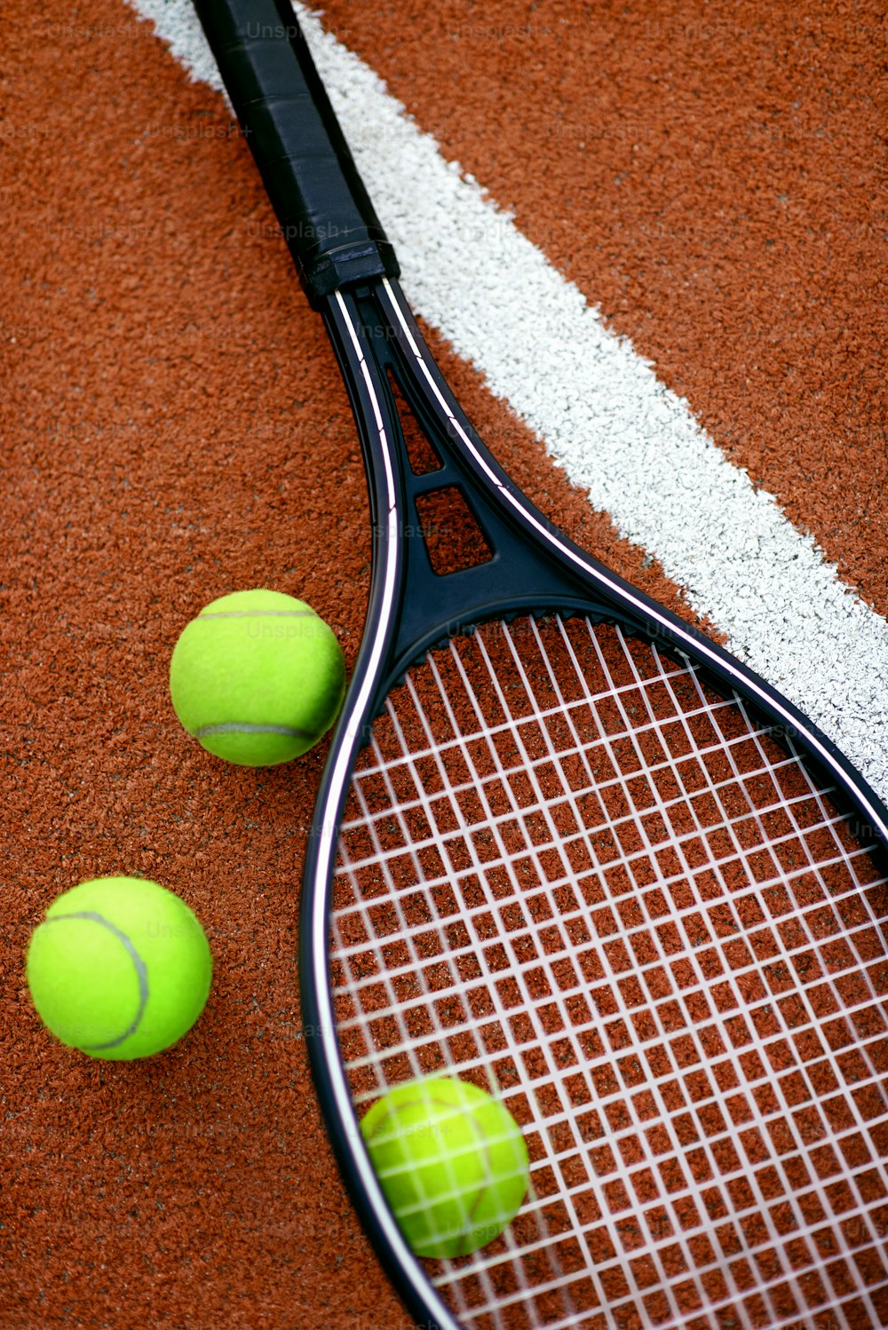 Sport. Tennis Balls And Racket On Court. Close Up Of Equipment For Sports Such As Tennis Racquet And Yellow Ball Lying On Open Court. High Quality