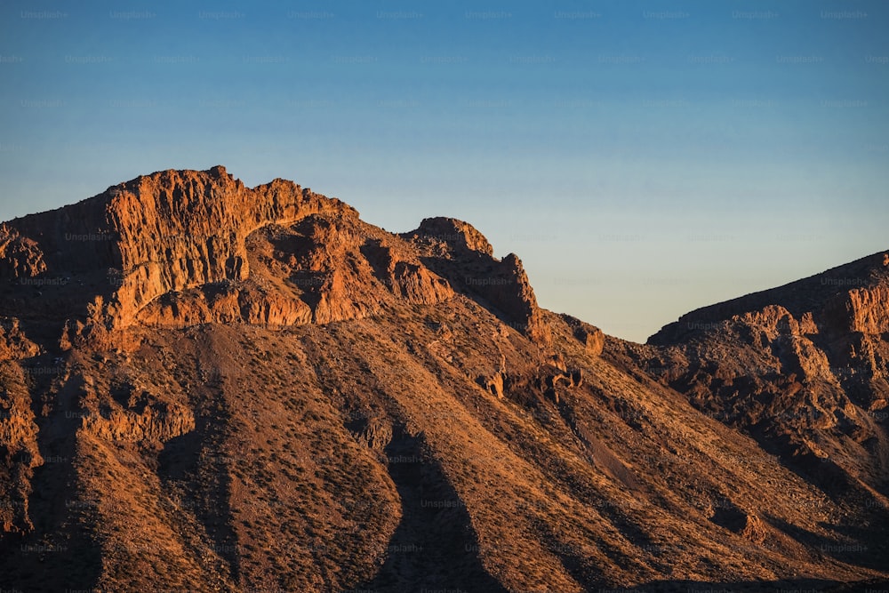 desert mountain in Tenerife on el teide vulcan to enjoy your trekking vacation. warm colors sunset on rocks mountain