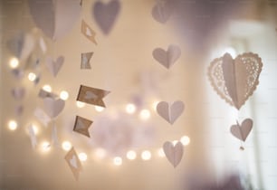 A white garland and lights festive background. A copy space.