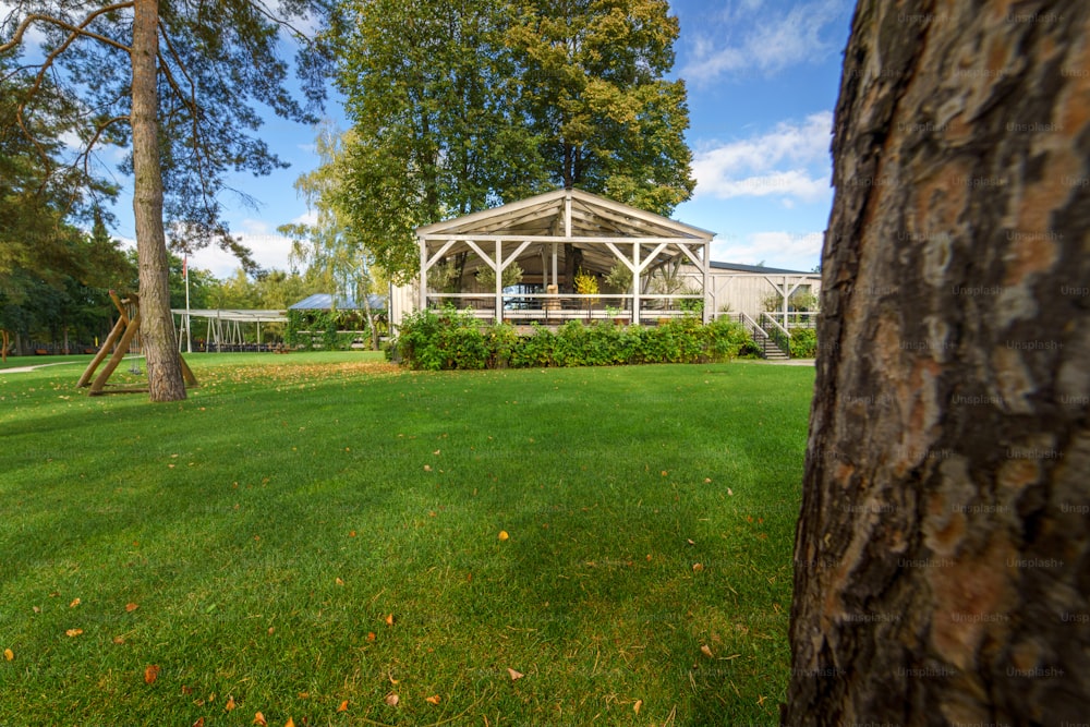 An outdoor hotel area with garden and terrace