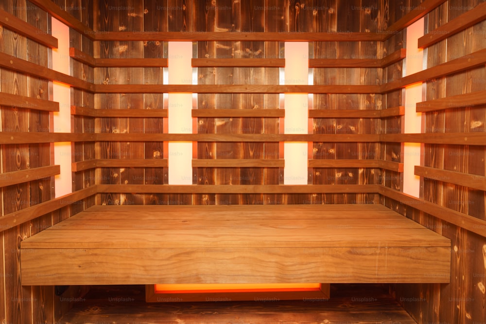 An interior of an empty wooden steam room