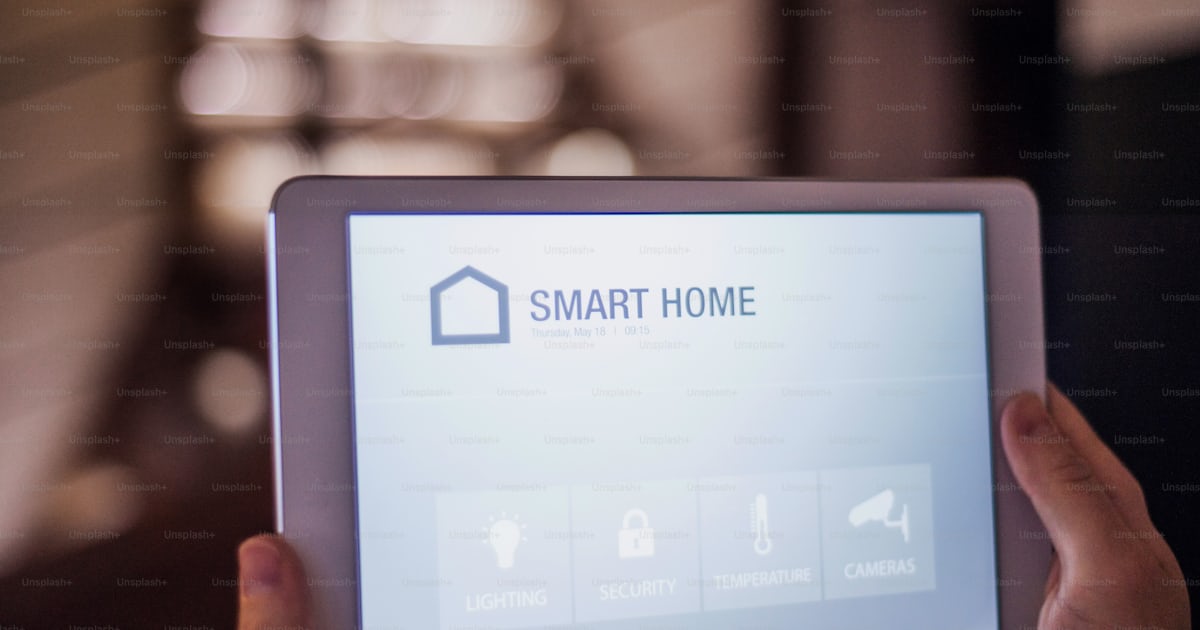 A tablet with smart home control system.A tablet with smart home ...
