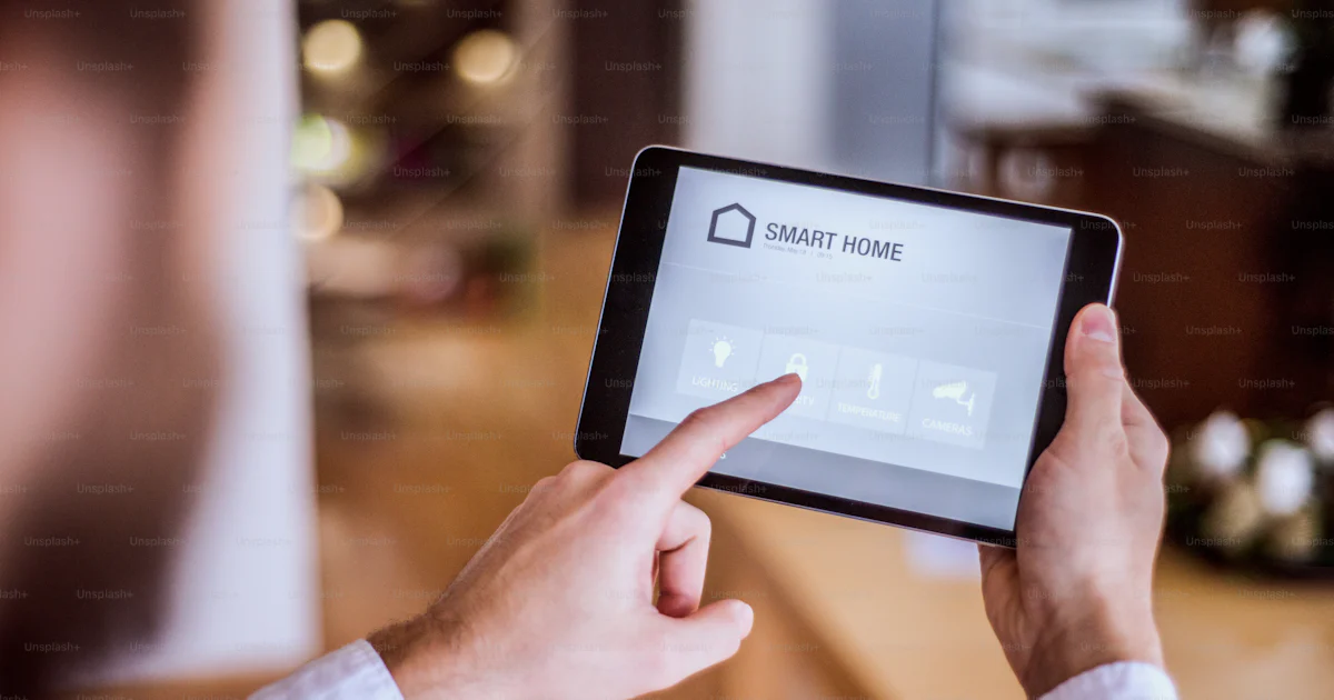 A tablet with smart home control system.A tablet with smart home ...