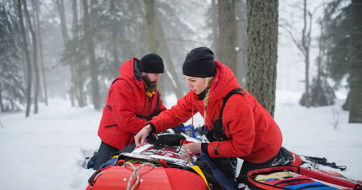 Paramedics from mountain rescue service provide operation outdoors in ...