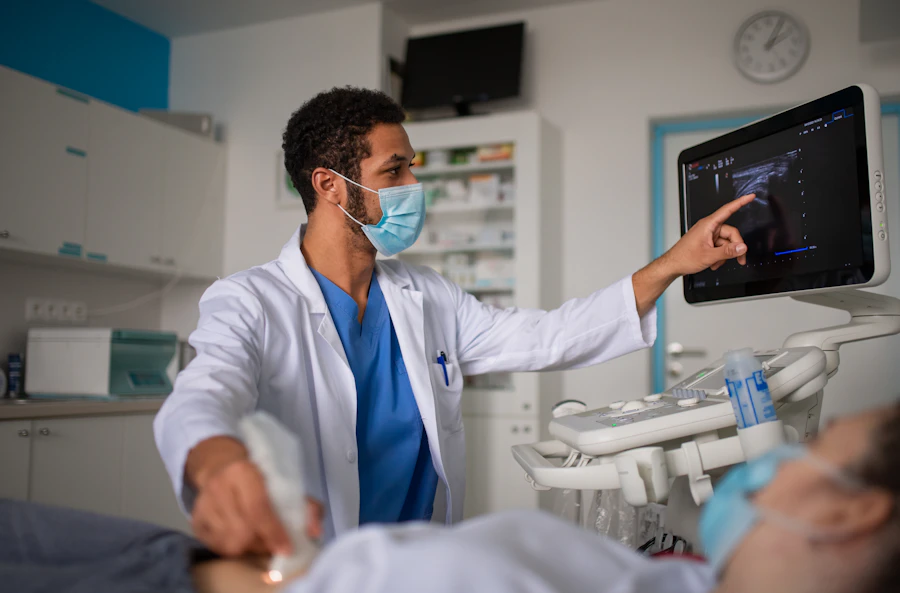 Physician examining a patient in a modern exam room at Cabo Medical Center