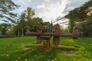 An outdoor empty wooden playground in restaurant area.