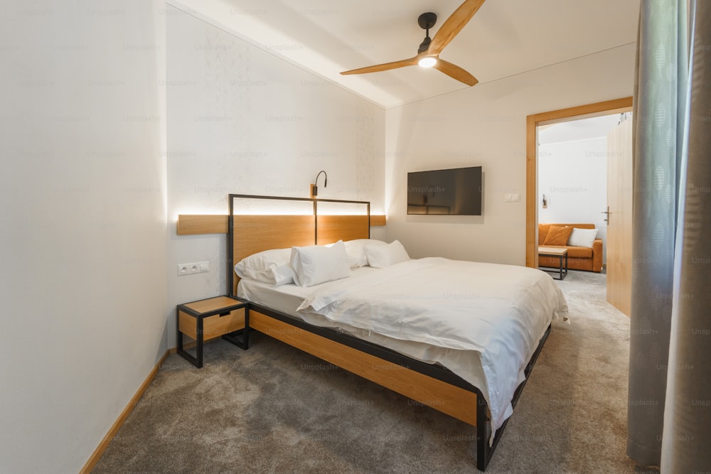 An interior of modern bedroom suite in luxury hotel