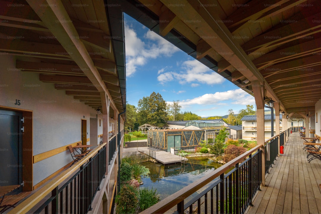A view from terrace of modern hotel with garden pond