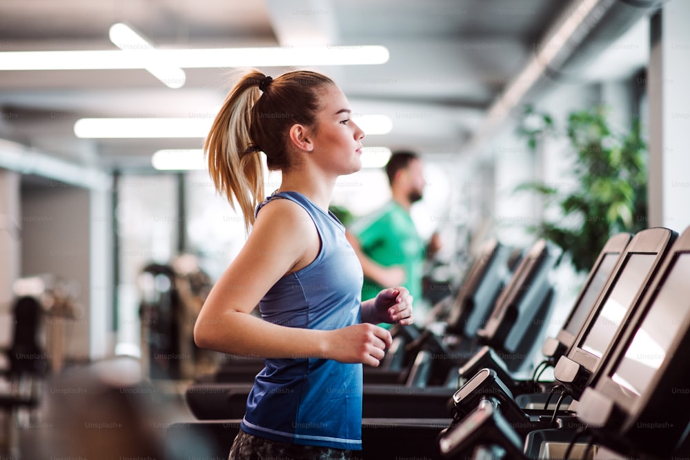 Cropped of a Young Female in White Fitness Attire Doing Cardio Exercises  Stock Photo - Image of person, young: 275840946