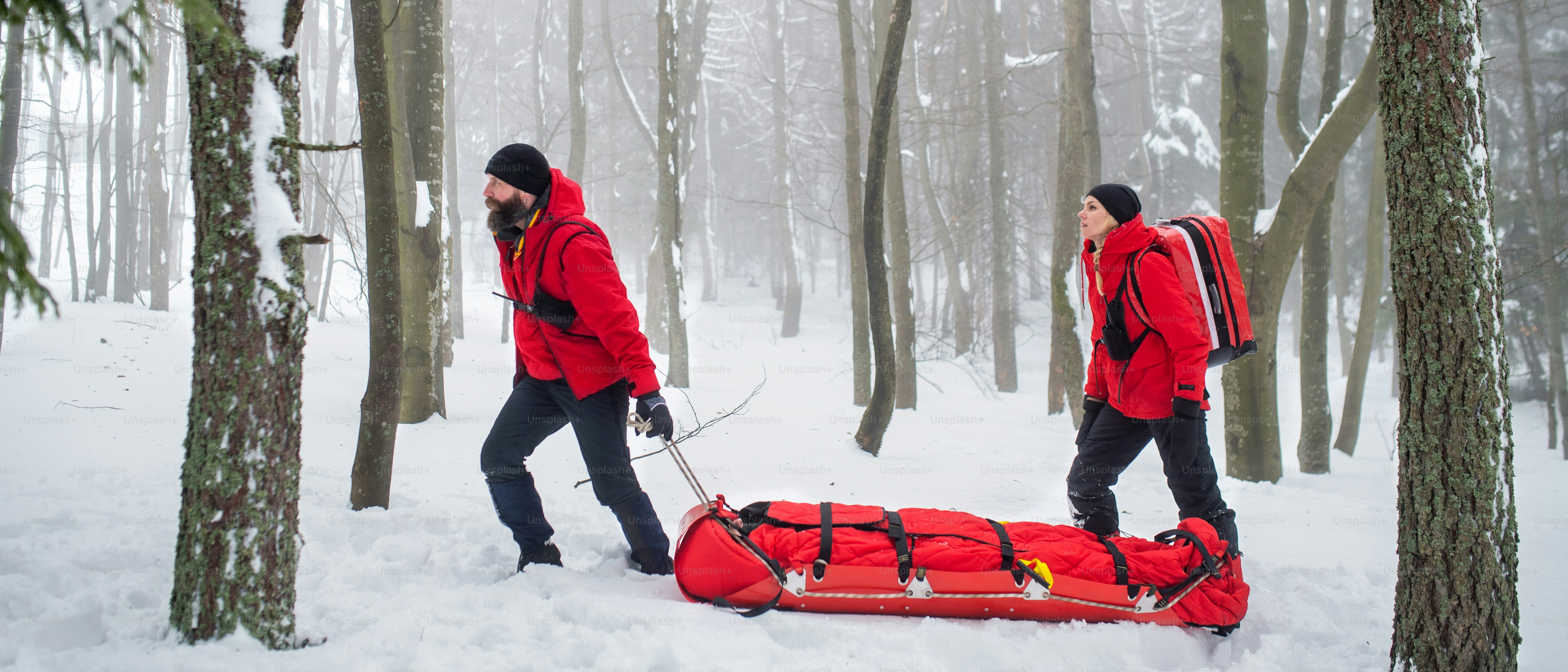Paramedics from mountain rescue service provide operation outdoors in ...