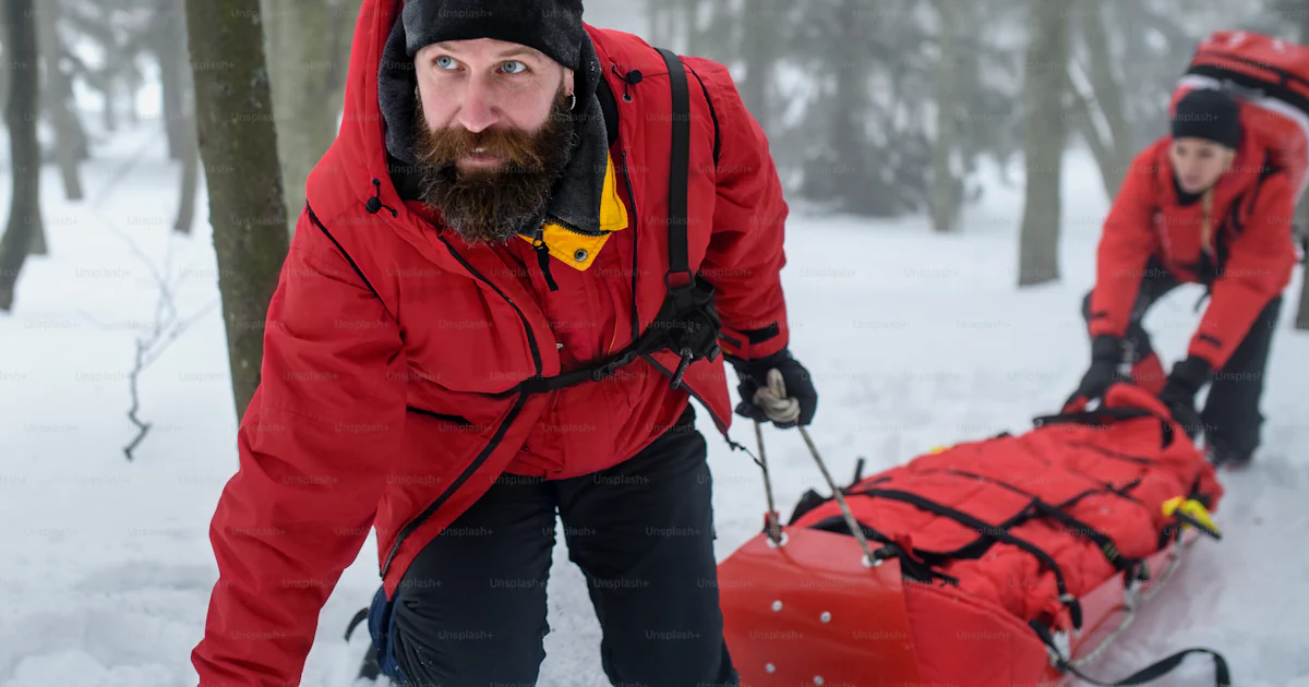 Paramedics from mountain rescue service provide operation outdoors in ...
