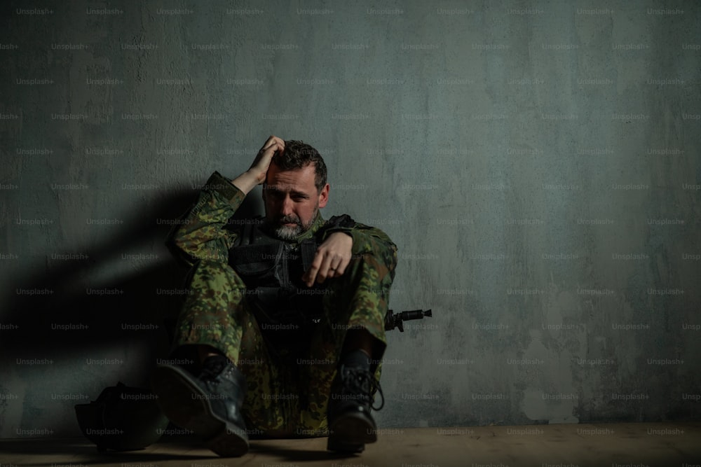 A frustrated military soldier sitting in boot camp