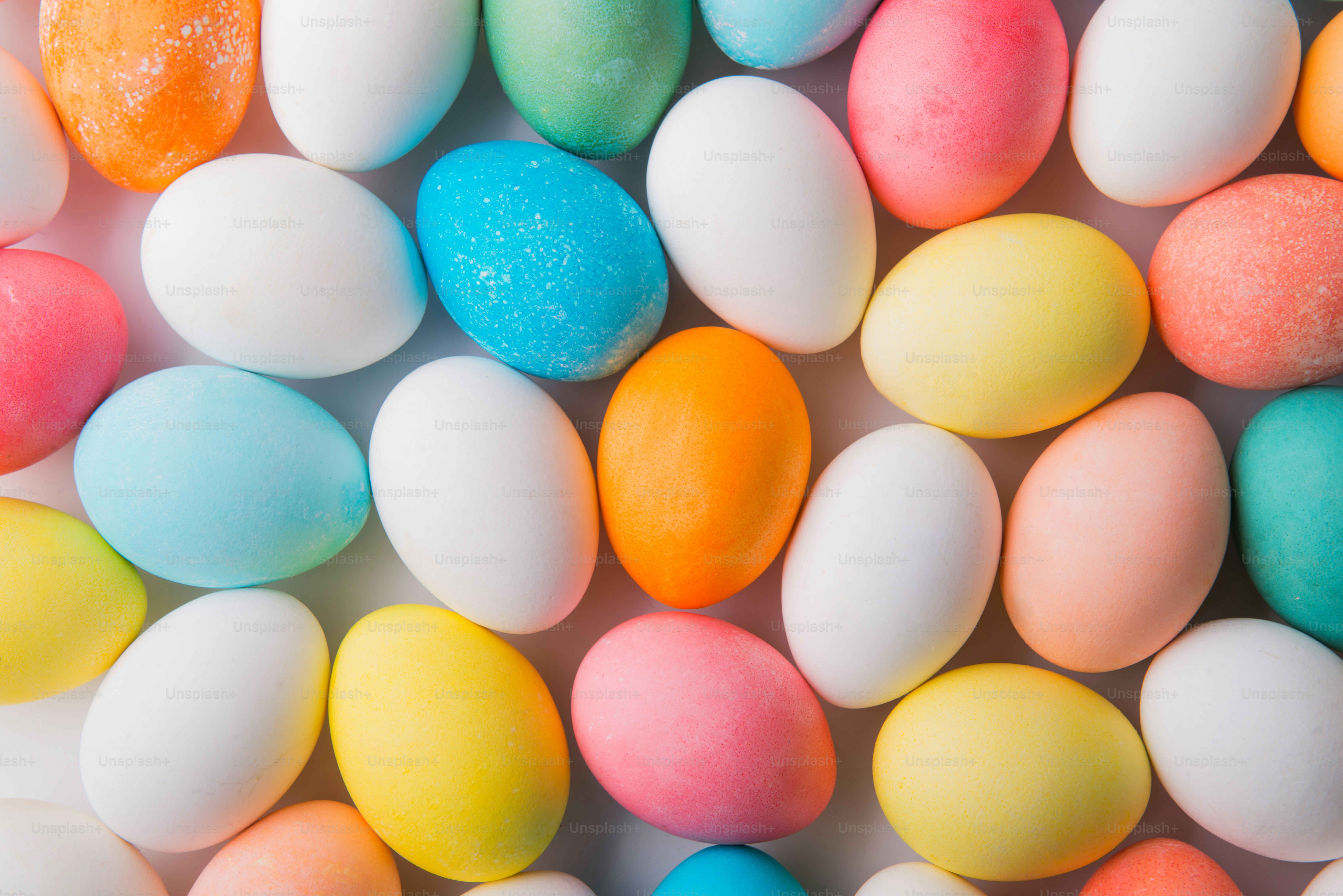 Eggs flat lay on a white background. Easter and spring composition. Studio shot.
