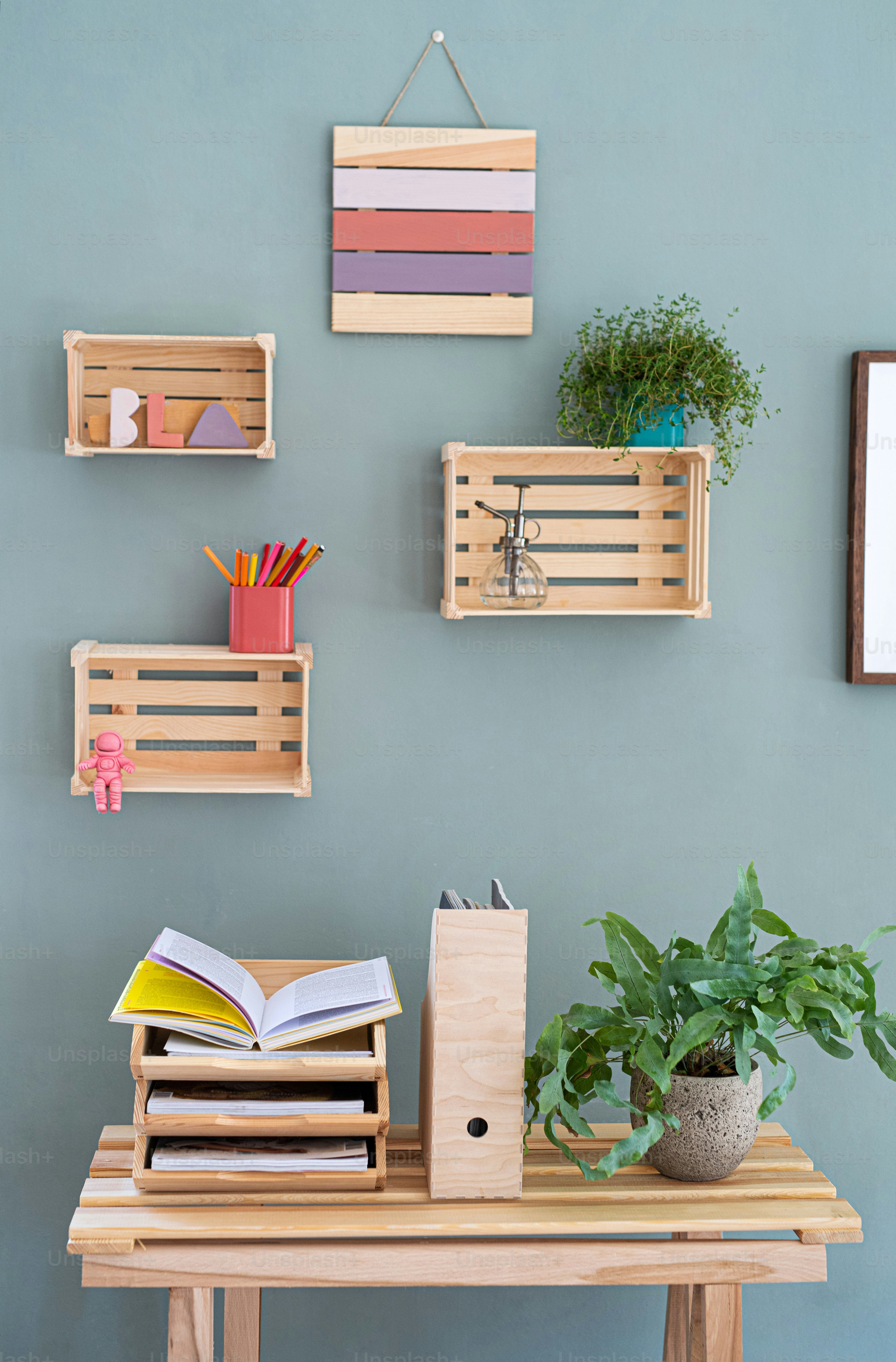 Wooden box shelves with decorations on the wall, a natural decor