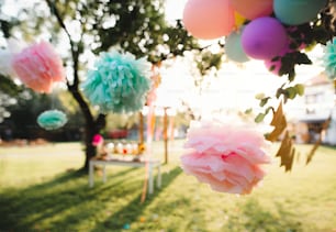 Decorated garden for birthday party outdoors in summer, celebration concept.
