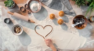 A flat lay top view of baking ingredients, desktop and hobby concept.