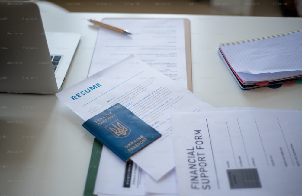 An application forms for Ukrainian refugeeson desk in asylum centre.