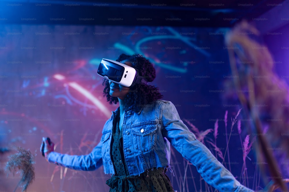 Metaverse digital cyber world technology, girl with virtual reality VR goggles playing augmented reality game, futuristic lifestyle